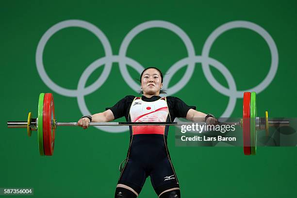 Mikiko Andoh of Japan competes during the Women's 58kg Group A weightlifting contest on Day 3 of the Rio 2016 Olympic Games at the Riocentro -...