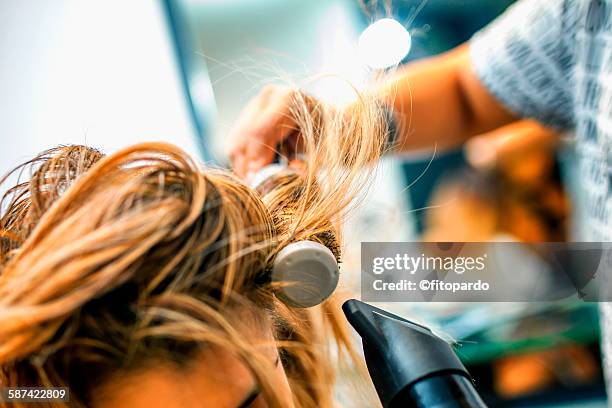 hair dresser in a salon - john nollet hairdresser bildbanksfoton och bilder