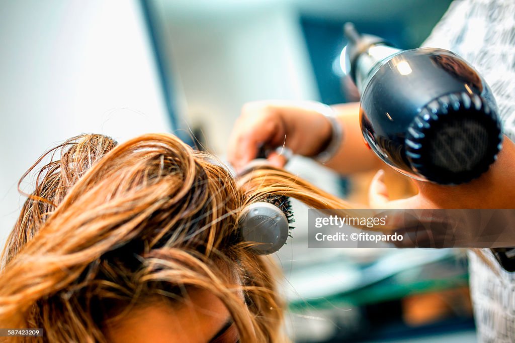 Hair stylist in a hair salon