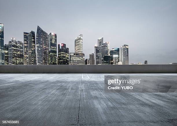 the city parking lot - singapore cityscape stock pictures, royalty-free photos & images