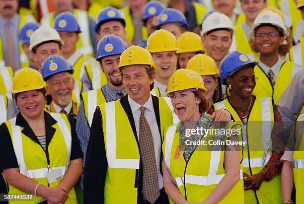 British Prime Minister Tony Blair attends the builder's rite of 'topping out' as the Millennium Dome reaches completion, London, 22nd June 1998.