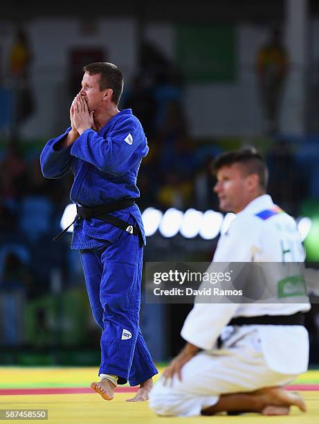 Dirk van Tichelt of Belgium celebrates after defeating Miklos Ungvari of Hungary in the Men's -73 kg Contest for Bronze Medal B on Day 3 of the Rio...