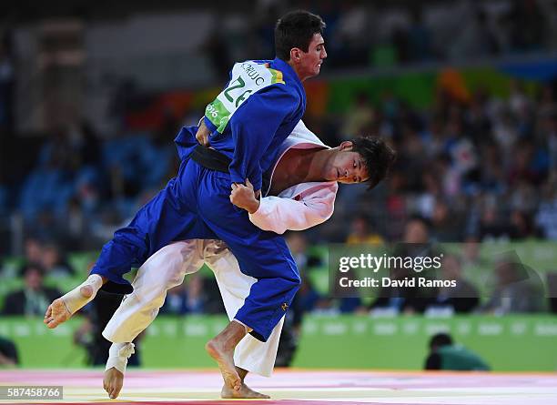 Shohei Ono of Japan competes against Rustam Orujov of Azerbaijan in the Men's -73 kg Final - Gold Medal Contest on Day 3 of the Rio 2016 Olympic...