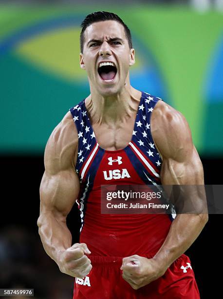 Alexander Naddour of the United States reacts after competing on the vault during the men's team final on Day 3 of the Rio 2016 Olympic Games at the...