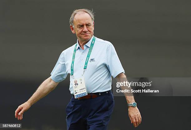 International Golf Federation President Peter Dawson walks across a green during a practice round during Day 3 of the Rio 2016 Olympic Games at...