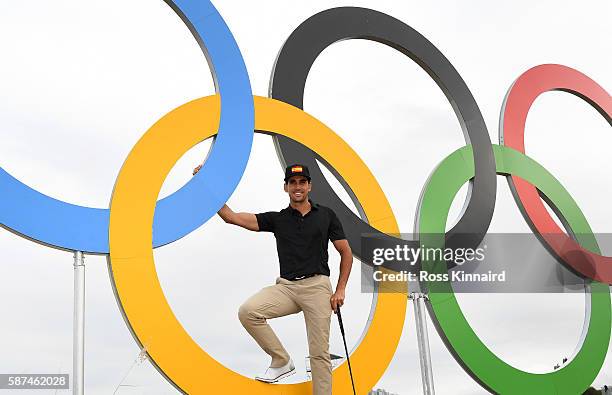 Raffa Cabrera-Bello of Spain in front of a set of Olympic rings during a practice round at Olympic Golf Course on August 8, 2016 in Rio de Janeiro,...