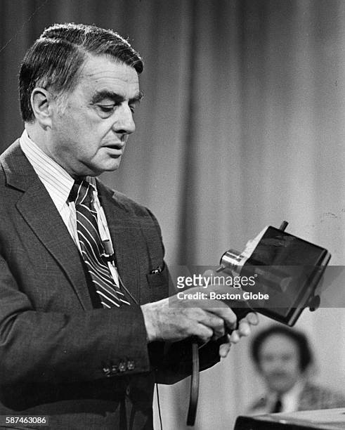 Dr. Edward Land demonstrates the new instant movie camera at the annual shareholders meeting in Needham, Mass., on April 26, 1977.