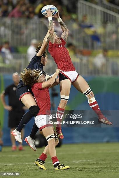 Canada's Jennifer Kish catches the ball in the womens rugby sevens bronze medal match between Canada and Britain during the Rio 2016 Olympic Games at...