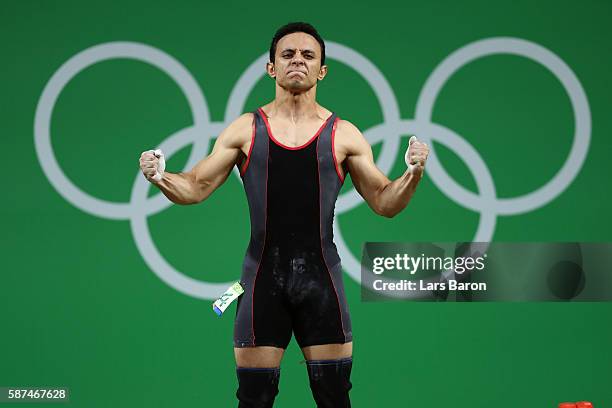 Ahmed Saad of Egypt reacts during the Men's 62kg Group A weightlifting contest on Day 3 of the Rio 2016 Olympic Games at the Riocentro - Pavilion 2...