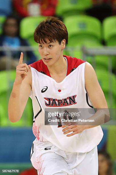 Ramu Tokashiki of Japan celebrates after scoring against Brazil during the women's basketball game on Day 3 of the Rio 2016 Olympic Games at the...