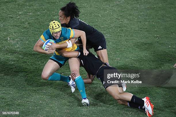 Shannon Parry Australia is tackled during the Women's Gold Medal Final Rugby Sevens match between Australia and New Zealand on August 8, 2016 in Rio...