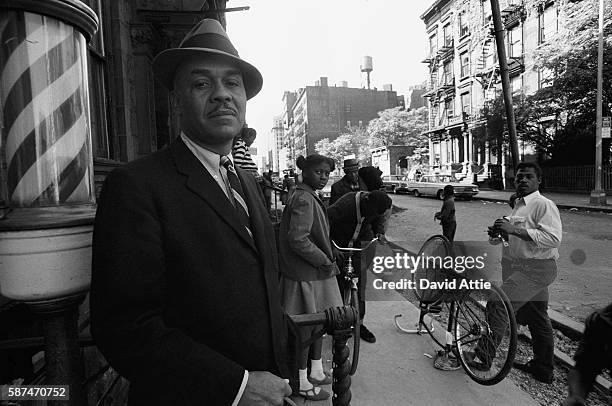 Novelist Ralph Ellison poses for a portrait in Harlem in New York City, New York.