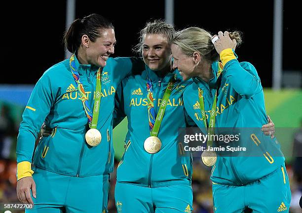 Members of team Australia celebrate with their gold medals after the medal ceremony for the Women's Rugby Sevens on Day 3 of the Rio 2016 Olympic...