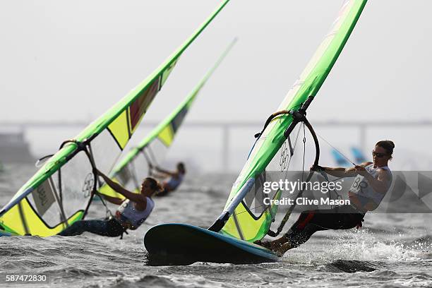 Bryony Shaw of Great Britain competes alongside Marina Alabau Neira of Spain during the Women's RS:X Race 2 on Day 3 of the Rio 2016 Olympic Games at...