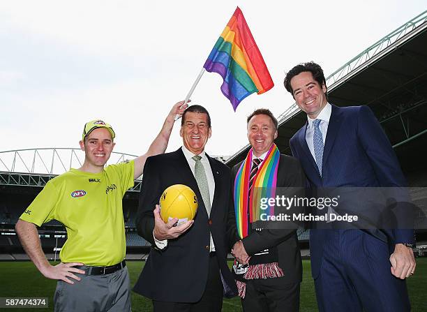 Goal umpire Michael Craig with the Pride Game rainbow goal umpire flag beyondblue Chairman Jeff Kennett, St Kilda CEO Matt Finnis and beyondblue and...