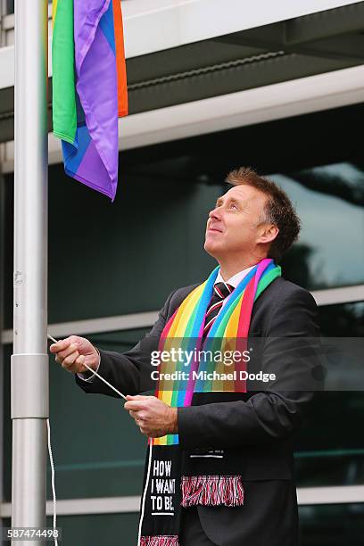 St.Kilda Saints CEO Matt Finnis wears the Pride Game rainbow while raising the Pride Game rainbow flag at AFL house during an AFL media opportunity...
