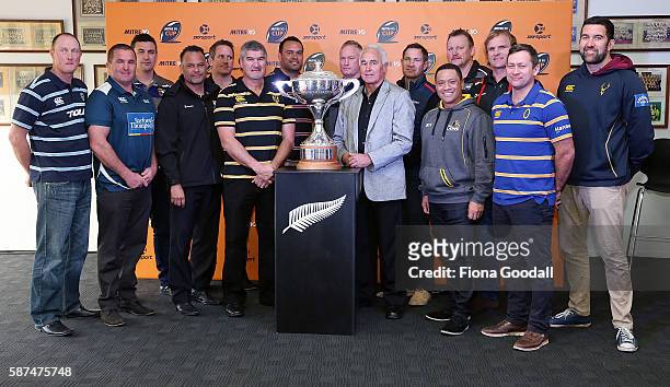 The 14 Mitre 10 coaches and Tuck Waka with the Rugby Cup during the 2016 Mitre 10 Cup Launch at Eden Rugby Club on August 9, 2016 in Auckland, New...