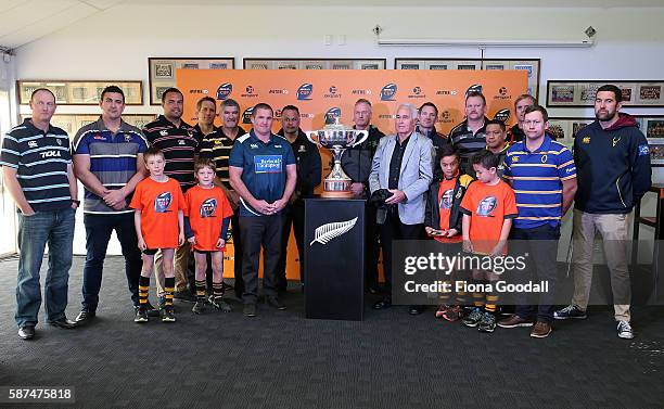 The 14 Mitre 10 coaches and Tuck Waka with the Rugby Cup during the 2016 Mitre 10 Cup Launch at Eden Rugby Club on August 9, 2016 in Auckland, New...