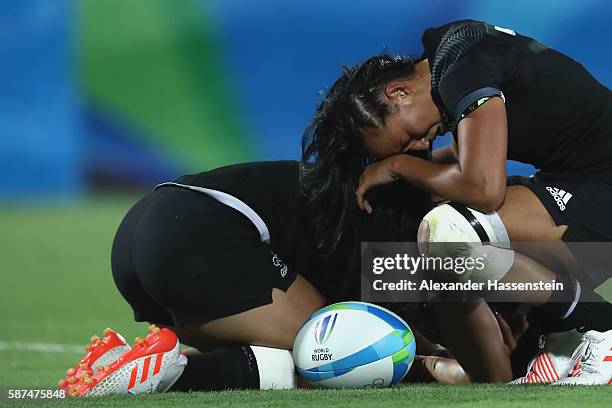 Portia Woodman of New Zeland reacts with her team mate Ruby Tui after the Women's Gold Medal Rugby Sevens match between Australia and New Zealand on...