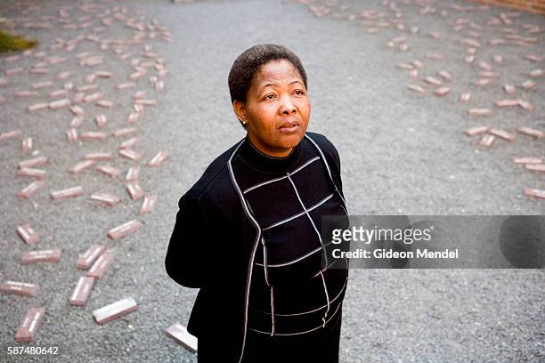 Antoinette Sithole, sister of Hector Peterson who was murdered by South African police thirty years ago, poses at at the Hector Peterson Museum in...