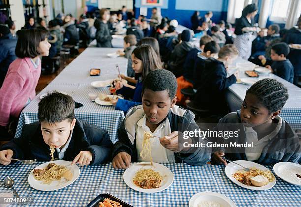 Pupils at Millfields Community School enjoy their school dinner of pasta and meatballs. The school has worked hard to improve the quality of its...