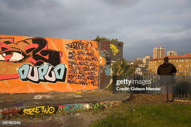 Bridge is covered in typical graffiti containing tags associated with a local gang on the Greenway in Newham. The Greenway is a footpath and cycleway...