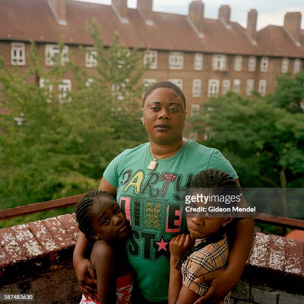 Resident of the Kingsmead Estate in Homerton in the eastern part of Hackney with her daughters. She is a recent immigrant from Africa and a single...