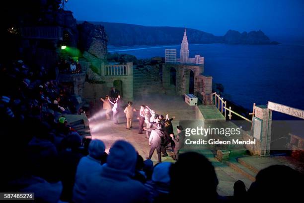 Performance of Guys and Dolls takes place at the famous Minack Theatre in Cornwall. This remarkable open-air amphitheatre is carved into the rock...