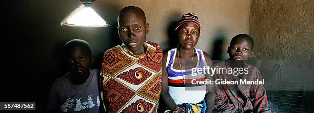 Teresinha Murezi is a terminally sick with AIDS. She lives on the outskirts of Chimoio, on the Beira Corridoor, where she and her two children Jono...