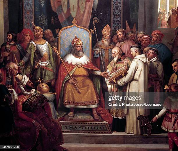 Charlemagne surrounded by his principal officers welcomes Alcuin who shows him manuscripts, work of his monks in 781. Detail of the. Painting by...