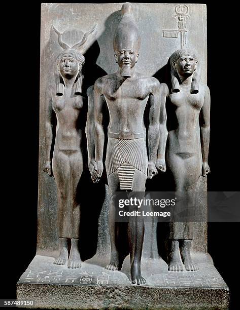 Egyptian civilization: Triad of Menkaure - king Menkaure wearing the white crown of Upper Egypt, with the goddess Hathor to his right and the 17th...