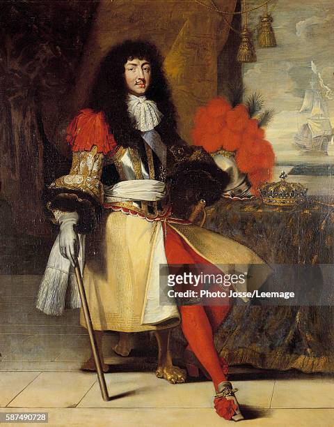 Full-length portrait of Louis XIV, King of France and of Navarre - circa 1665-1670- in armour with the crown and the sceptre on the table before a...