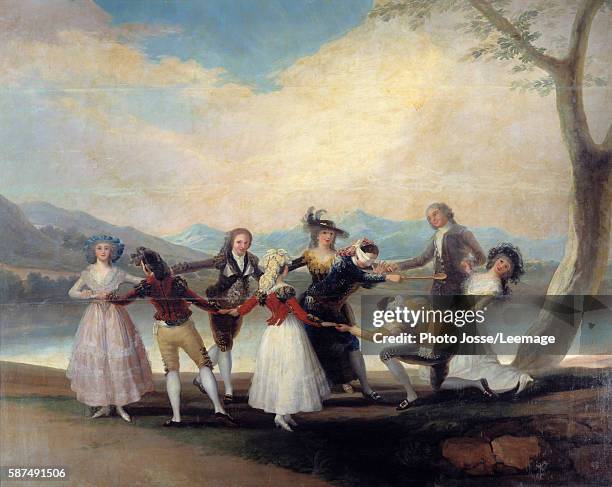 Colin Maillard , the game of Blind Man's Bluff. Circle of young people dancing around the blindfolded gentleman. Painting by Francisco de Goya y...