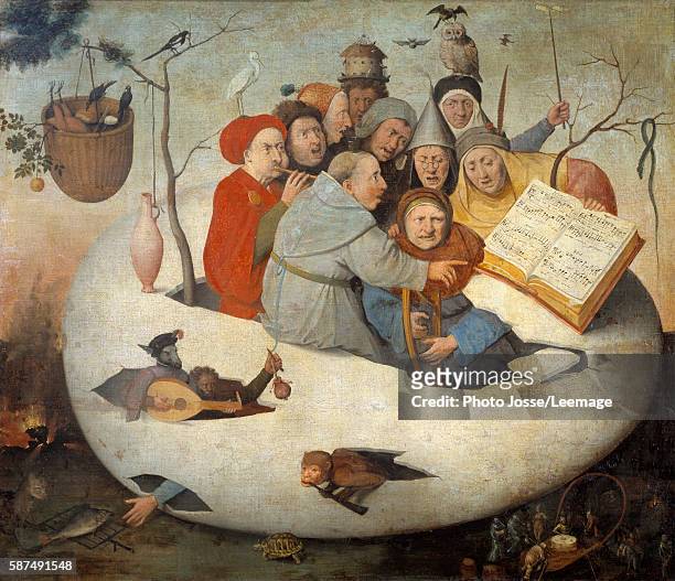 The Concert in the Egg . Satire of alchemy symbolized by the philosophical egg. Painting after Jheronimus Van Aeken called Hieronymus Bosch , 15th...
