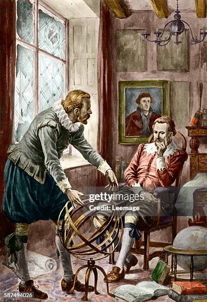 Danish astronomer Tycho Brahe and his assistant the astronomer Johannes Keppler working on a armillary sphere in Praga in 1600 - Illustration Private...