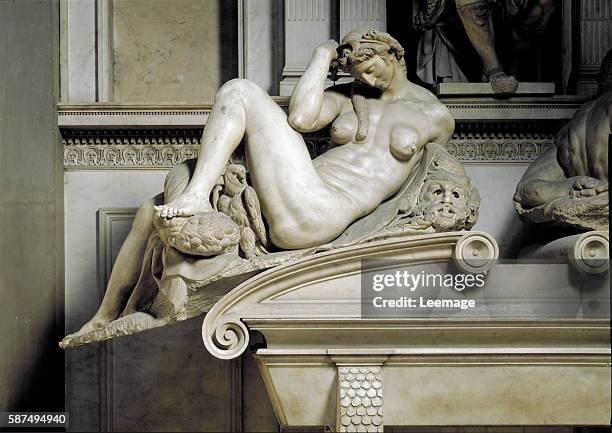Tomb of Giuliano de Medici , Duke of Nemours, with allegorical figures of Day and Night. Marble sculpture by Michelangelo Buonarroti known as...