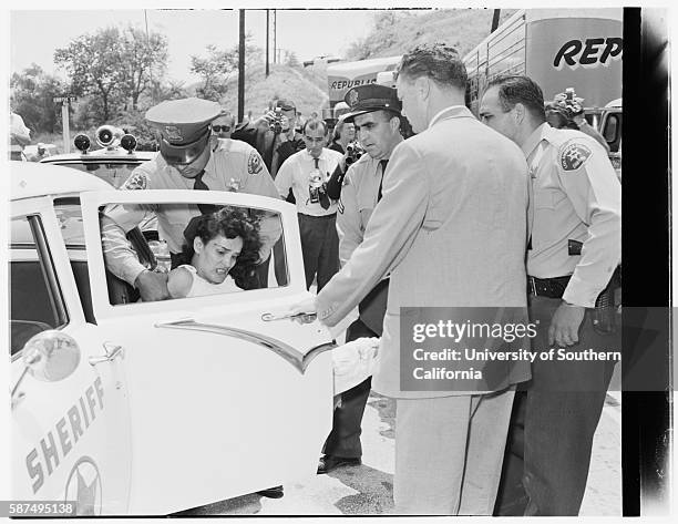 Aurora Vargas being arrested during her eviction from Chavez Ravine.