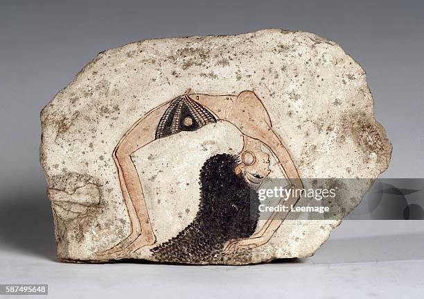 Ostrakon figure: a woman acrobat dancer. Limestone. 19th dynasty . Egyptian Museum, Turin, Italy