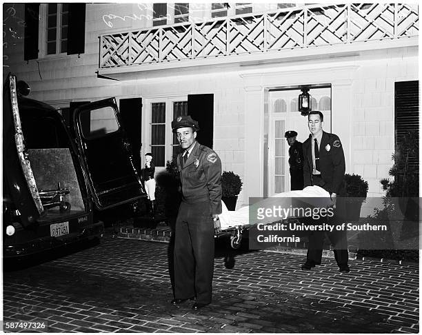 Body of Johnny Stompanato being removed from home of Lana Turner.