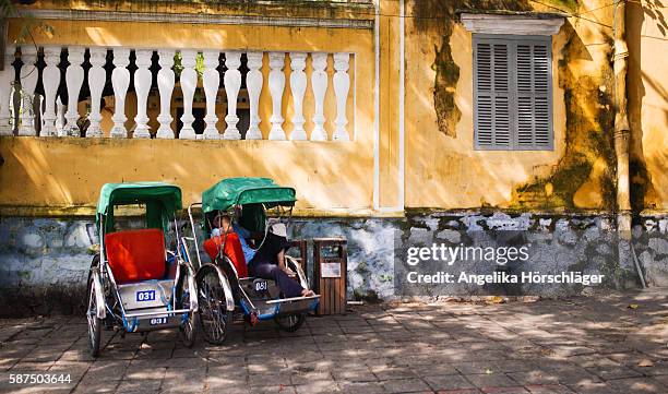 streets of hoi an - pedicab stock pictures, royalty-free photos & images