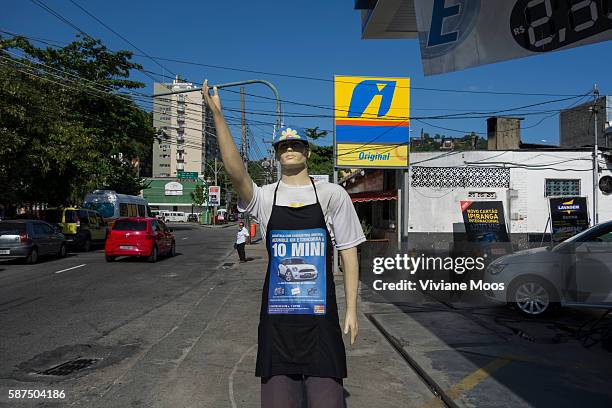 Mannequin advertising the location for Ipiranga station for fuel, gasoline, additives and fluids for the car on a street in Barra da Tijuca, famous...