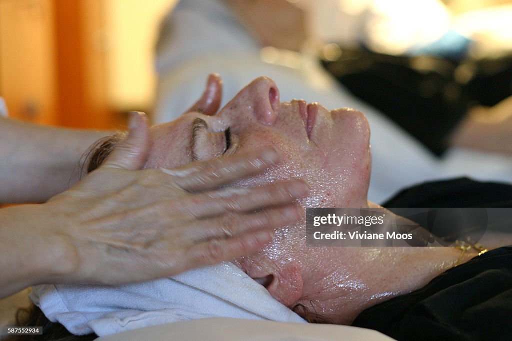 Woman Receiving Facial Massage