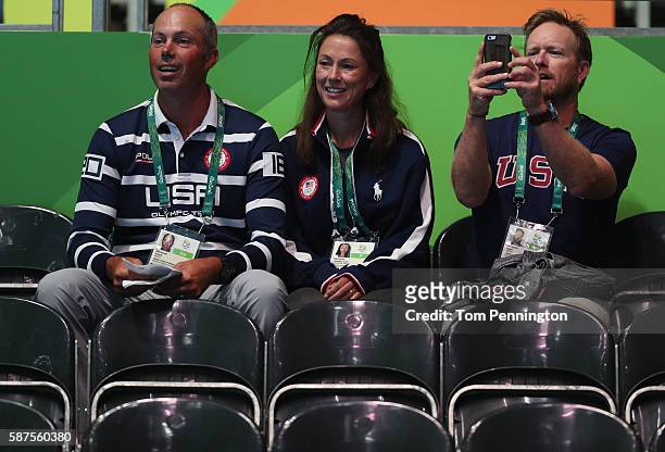 Athlete Matt Kuchar of the United States, wife Sybi Kuchar and caddie John Wood watch Round 3 of the Women's Singles Table Tennis on Day 3 of the Rio...