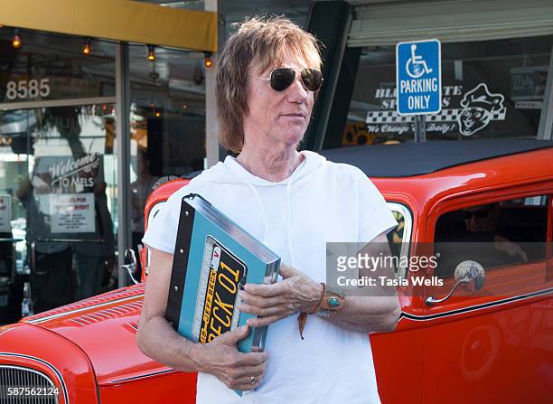 Guitarist Jeff Beck arrives at the Jeff Beck fan meet and greet in celebration of new book "BECK01" at Mel's Drive In on August 8, 2016 in West...