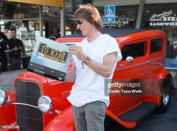 Guitarist Jeff Beck arrives at the Jeff Beck fan meet and greet in celebration of new book "BECK01" at Mel's Drive In on August 8, 2016 in West...