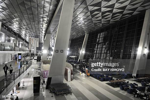This general view shows the interior of the boarding hall at the newly opened terminal 3 at Soekarno-Hatta International Airport in Tangerang, on the...