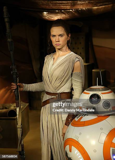 Daisy Ridley is unveiled as the new wax figure character Rey from "Star Wars: The Force Awakens" at Madame Tussauds on August 9, 2016 in London,...