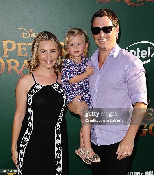 Actress Beverley Mitchell, husband Michael Cameron and daughter Kenzie Cameron attend the premiere of "Pete's Dragon" at the El Capitan Theatre on...