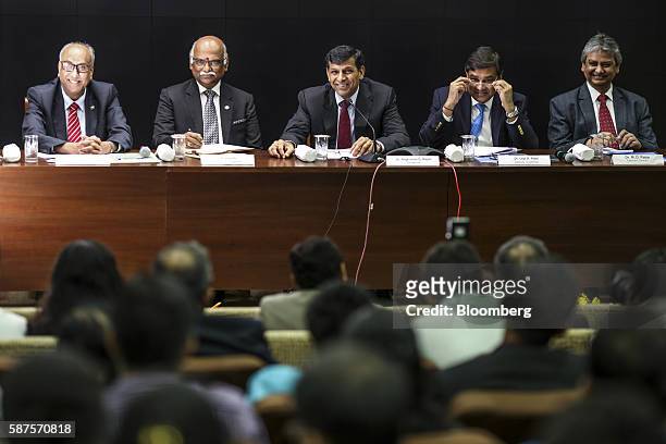 Subhash Sheoratan Mundra, deputy governor of the Reserve Bank of India , from left, R. Gandhi, deputy governor, Raghuram Rajan, governor, Urjit R....