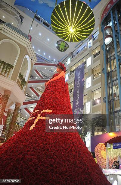 Model dress rose-clothed to celebrate the Chinese Valentine's Day in Harbin city of China on Aug 9 2016.Most Chinese remember being told this...